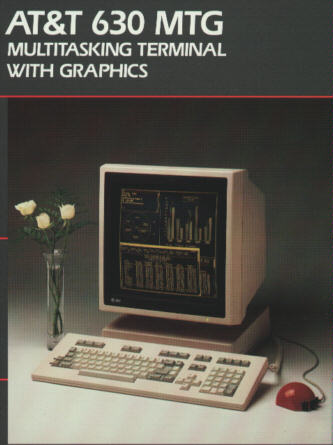 On the cover: A beige stand with a large 17"(?) screen on top of it, a keyboard in front, a red(!), round(!) mouse on the side. The screen is showing several windows.